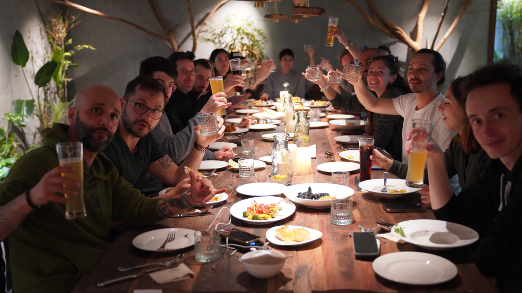 Guests dining at the long table